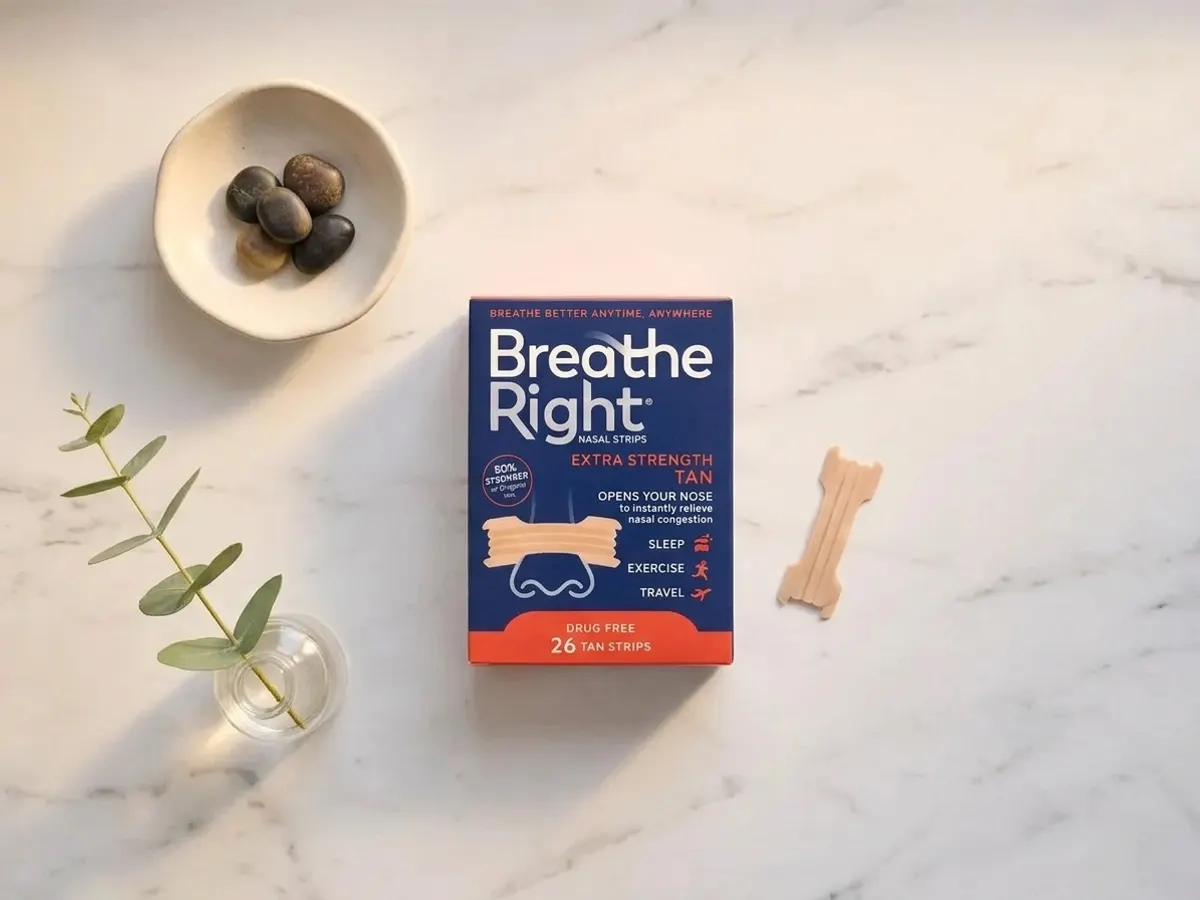 Breathe Right Extra Strength Nasal Strips Sample, flat lay on marble with minimal styling