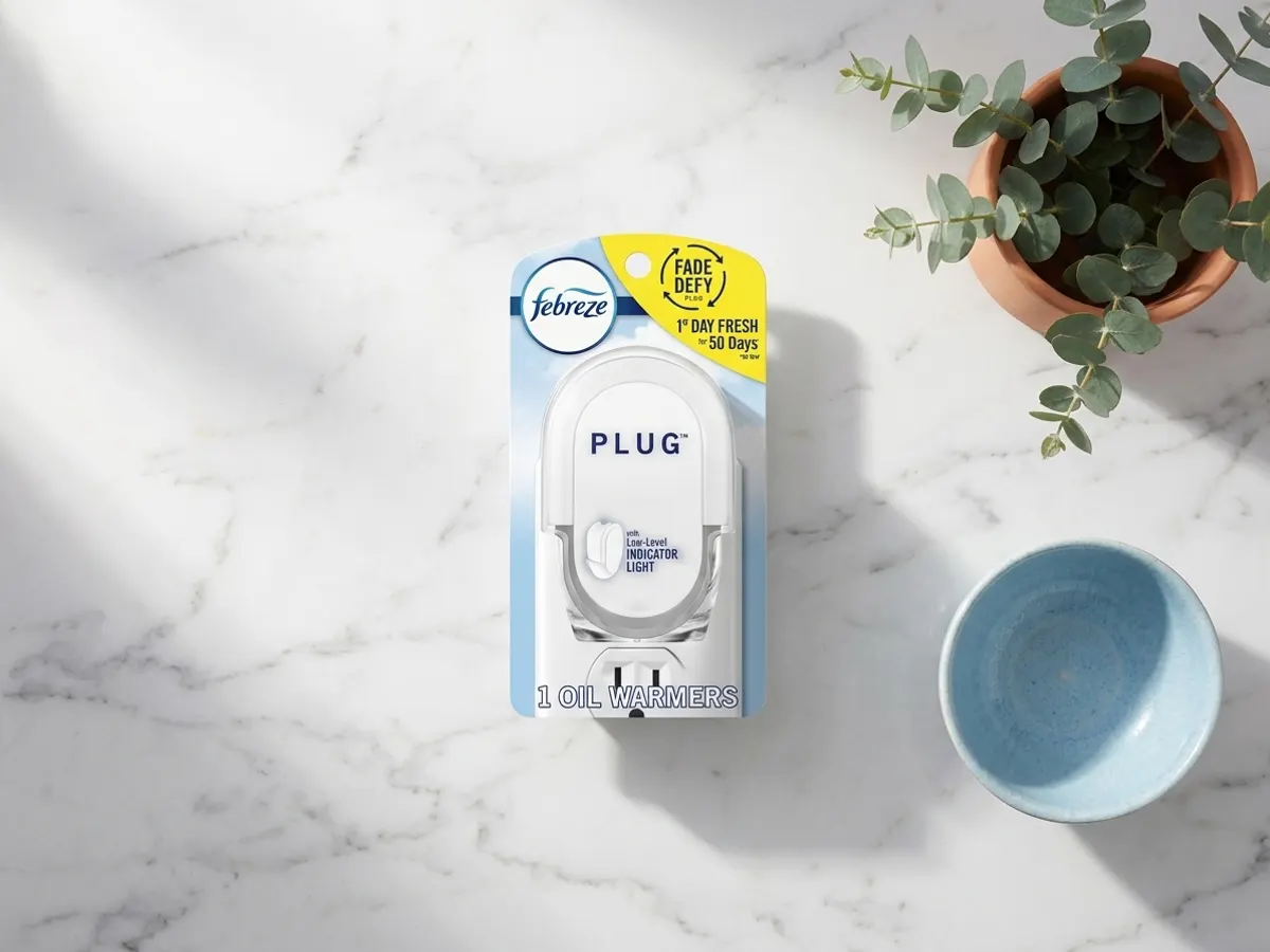 Grab a FREE Febreze Plug-In with a Walgreens Coupon, overhead flat lay on marble counter