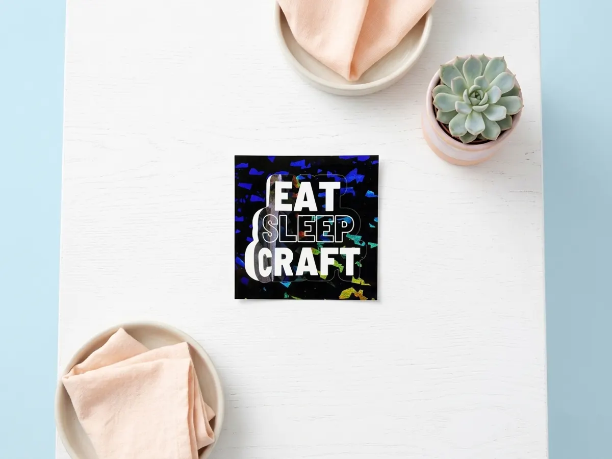 Explore CatPrint with a FREE Sticker & Paper Sample Pack, flat lay with complementary home accessories