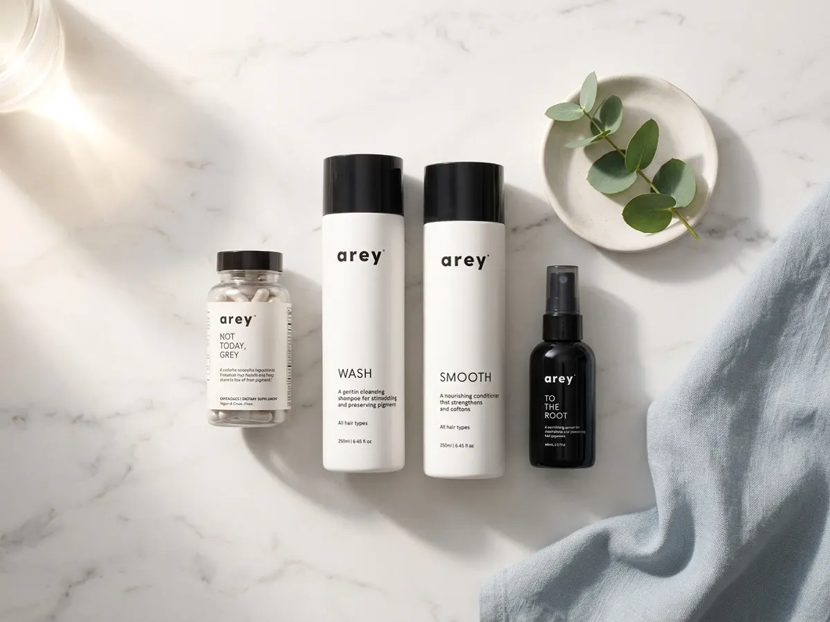 Get a FREE 3-Month Supply from Arey, flat lay with eucalyptus and soft linens