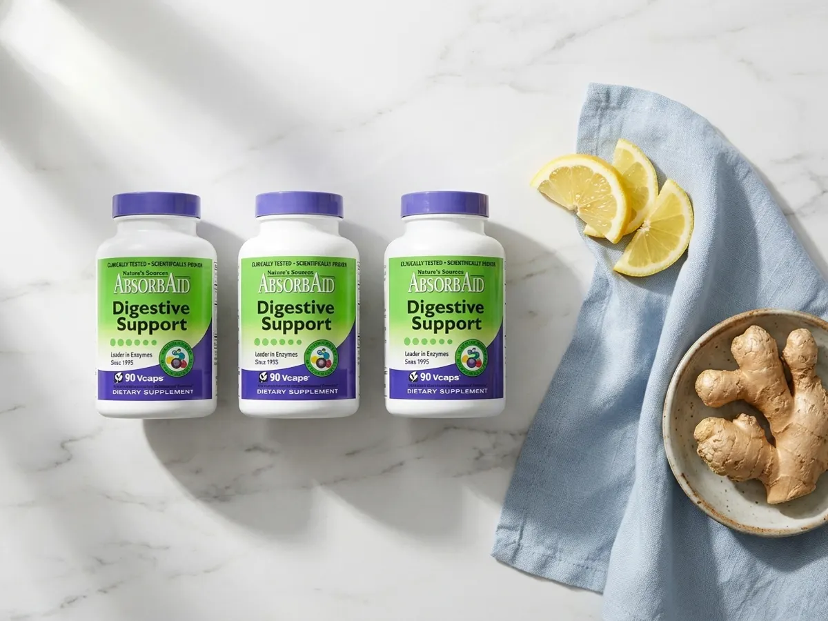 Claim a FREE AbsorbAid Digestive Enzymes Sample, overhead flat lay with citrus and spices