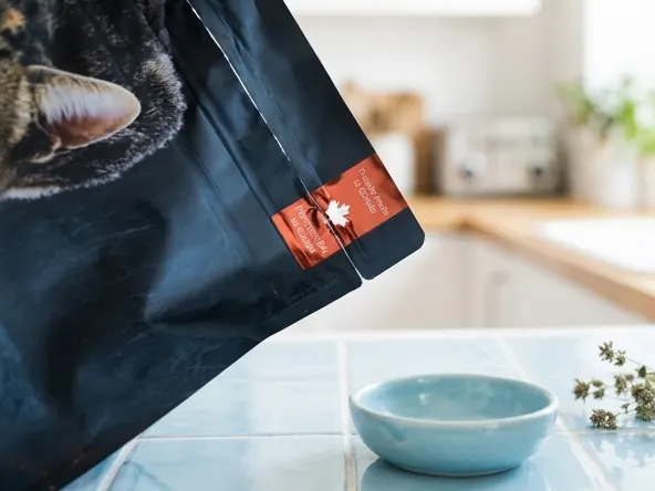 Enter to Win a FREE Year of Oven-Baked Tradition Pet Food, product angled on light blue tile surface