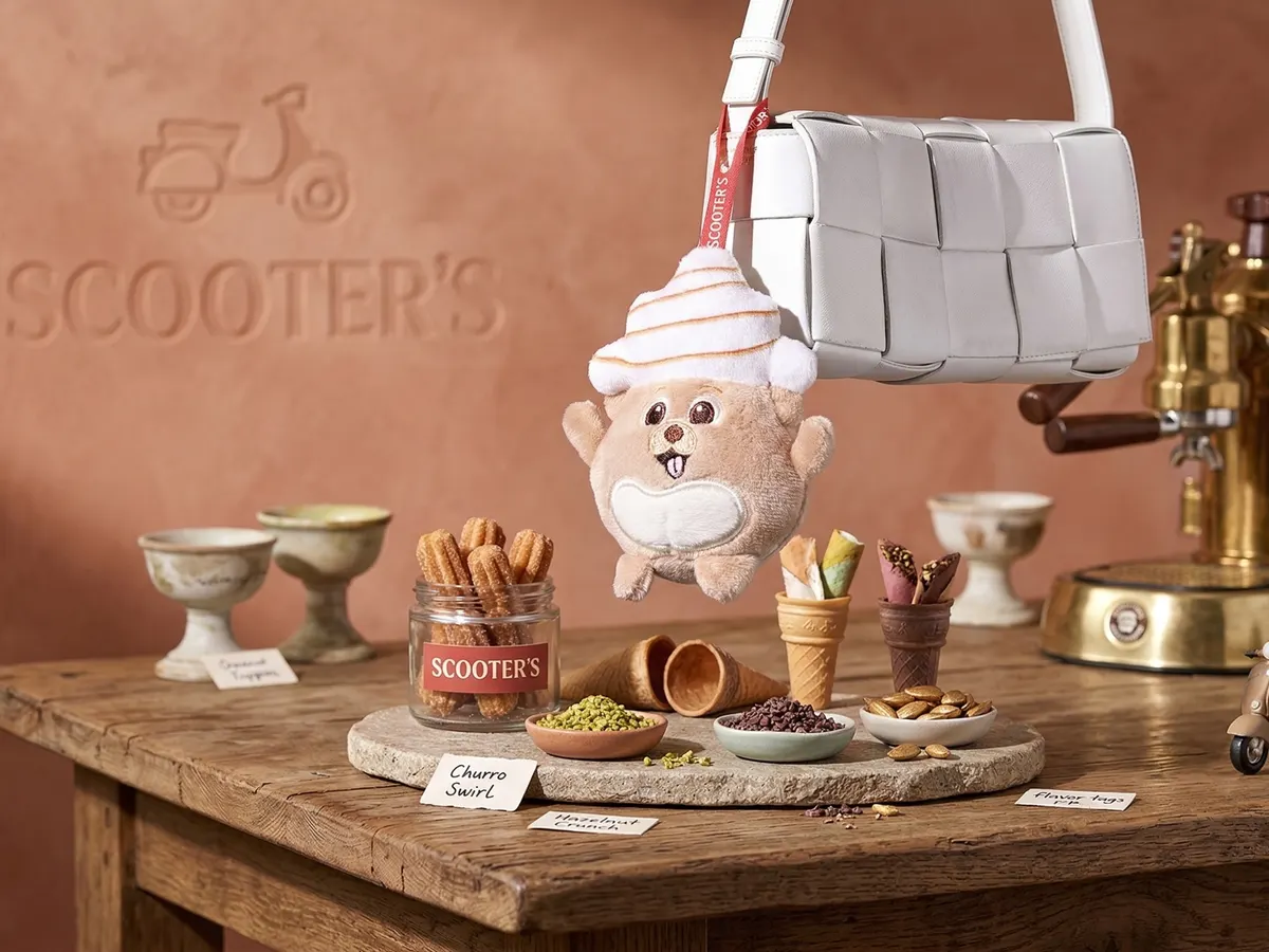Scooter's Coffee Bag Charm — free sample: Today only, get a free bag charm at Scooter’s Coffee with any purchase after 11 a.m.! Limit one per