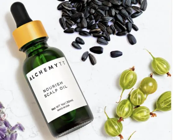 Revitalize Your Scalp: Free AlchemyTT Nourish Oil Sample!: free sample: AlchemyTT's promotion features a free sample of their Nourish Scalp Oil, designed to enhance scalp a