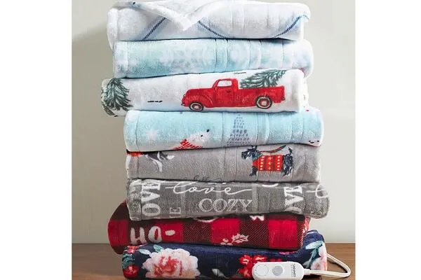 Heated Plush Throws for ONLY $29.99 : free sample: Looking for heated plush throw to wrap yourself this winter? Macys is offering this Novelty Printed